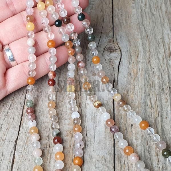 koralky-z-mineralu-kristal-s-rutilom-6mm-leskle-hladke-nebrusene-jedenny-mix-farebne-prie