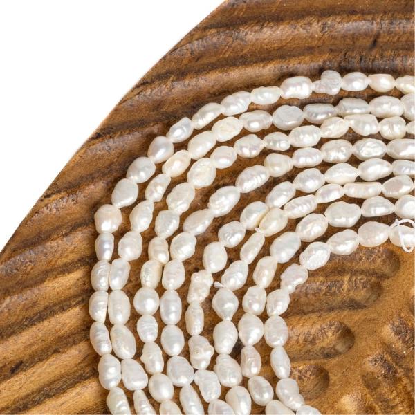 Perly ���n� kor�lky 6x4mm podlouhl� ���ra
