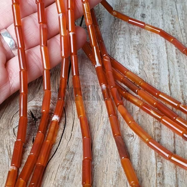 koralky-z-prirodneho-mineralu-karneol-trubicky-hladke-4x13mm-leskle-oranzove-podlhovaste-