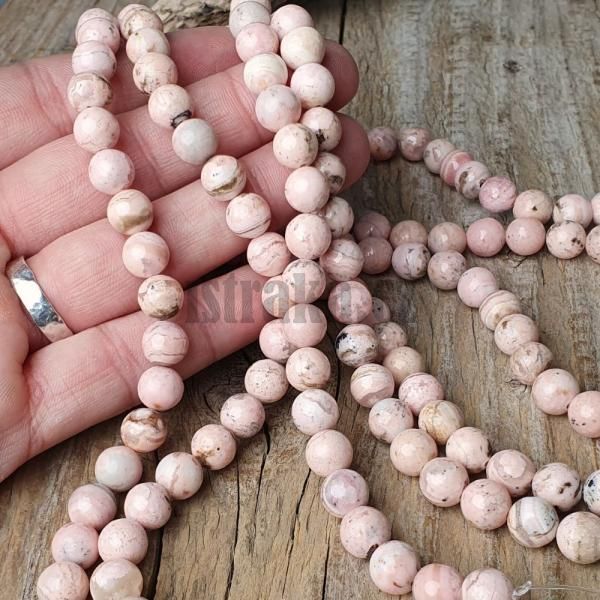 koralky-z-mineralu-rodochrozit-8mm-svetloruzove-leskle-blede-babypink-gulate-nebrusene-