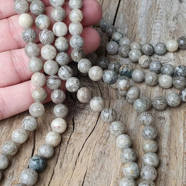 koralky-z-mineralu-kristal-garden-quartz-8mm-leskle-sedohnede-sede-sive-goralk