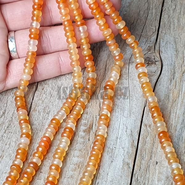 koralky-z-mineralu-karneol-svetly-4x6mm-tucne-rondelky-leskle-hladke-strakate-zlte-oranzo