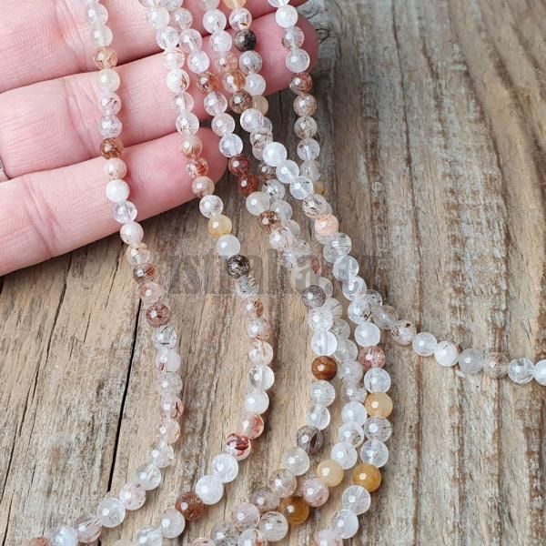 koralky-z-mineralu-kristal-s-rutilom-4mm-leskle-gulate-strakate-hladke-bezove-s-inkluziam