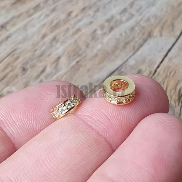 koralka-rondelka-7x3mm-zlata-s-bielymi-zirkonmi-velkodierova-leskla-okruhla-goralka