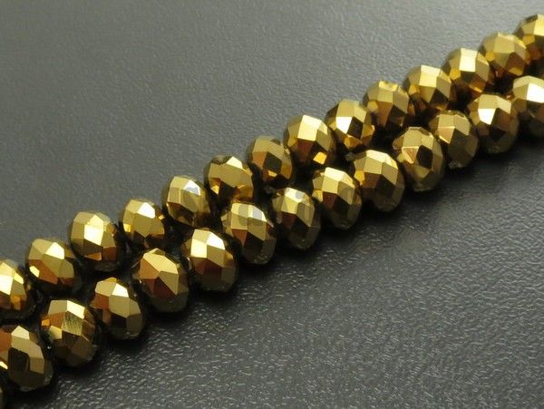 Korálky skleněné 6x4mm rondelky zlaté šňůra
