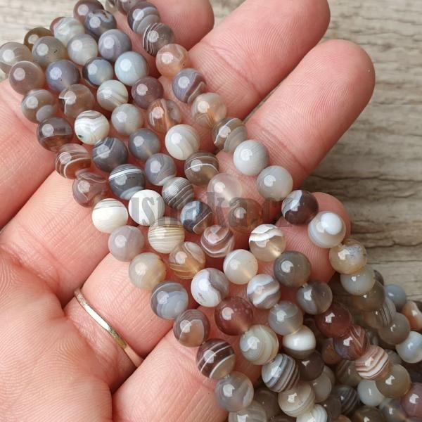 goralky-z-mineralu-achat-botswana-6mm-leskle-hladke-sede-hnede-bezove-smotanove-nebrusene